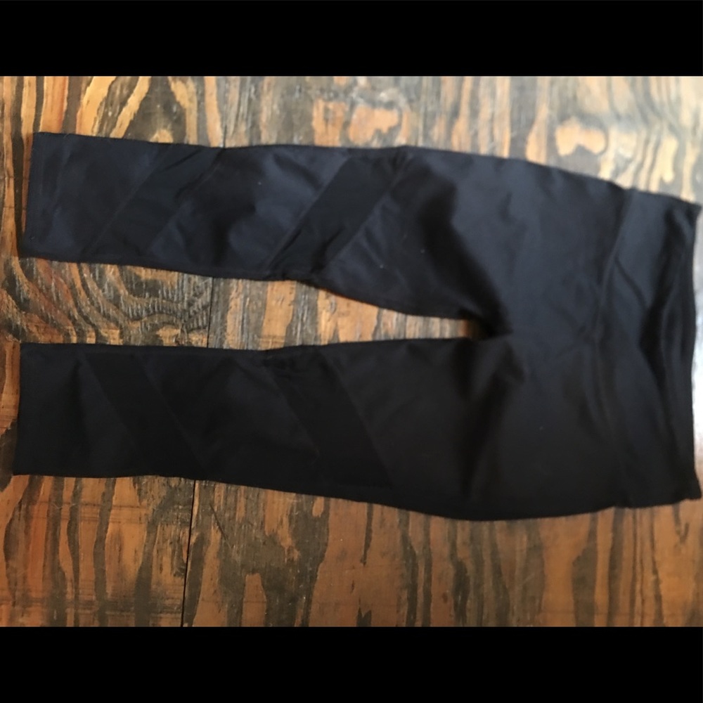 Black fabletics Capri pant with mesh detail